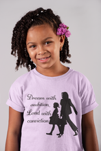 Load image into Gallery viewer, Youth Kamala shirt, Dream by Ambition, Young girl walking with VP Kamala Harris
